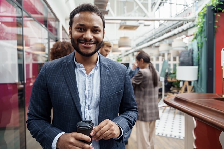 portrait-of-indian-businessman-standing-in-modern-2025-03-13-12-46-44-utc
